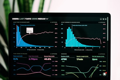 A detailed close-up of a computer monitor showing complex sports statistics and league tables